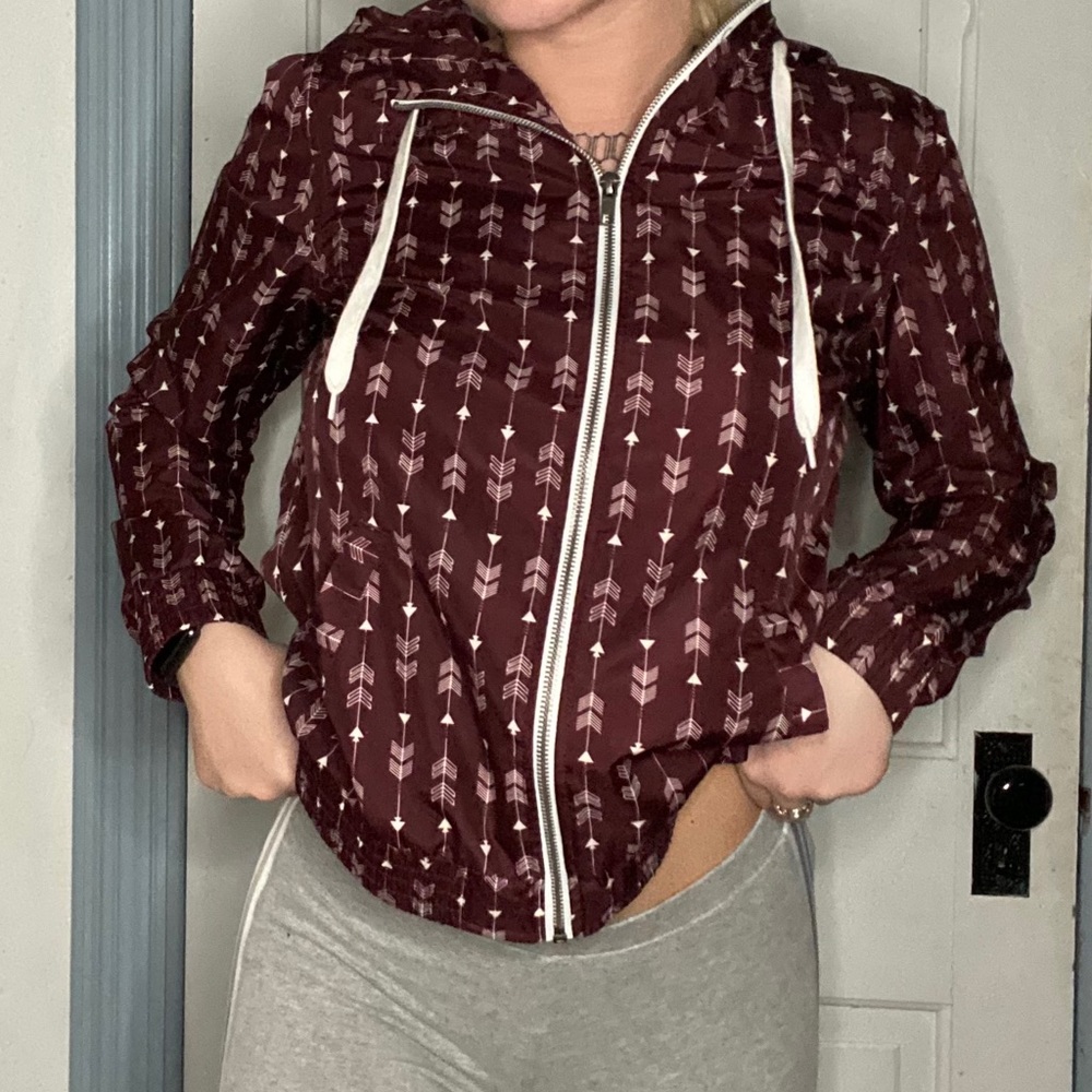 Maroon Zumiez arrow windbreaker